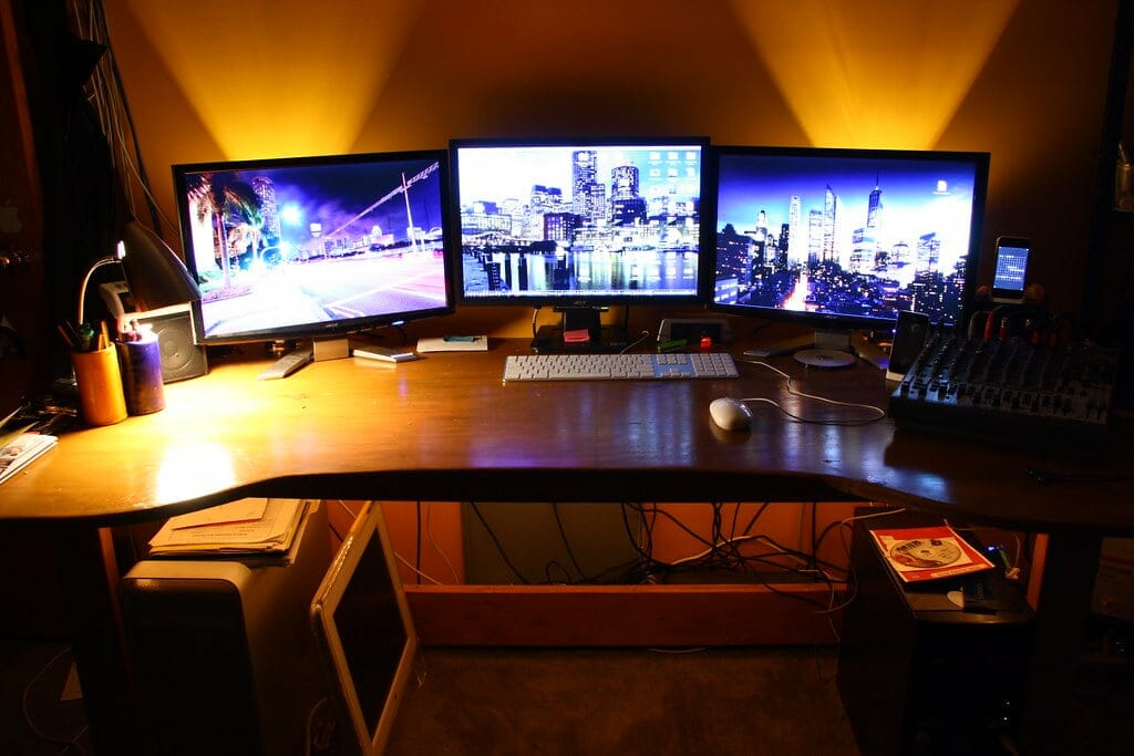 workspace with 3 monitors