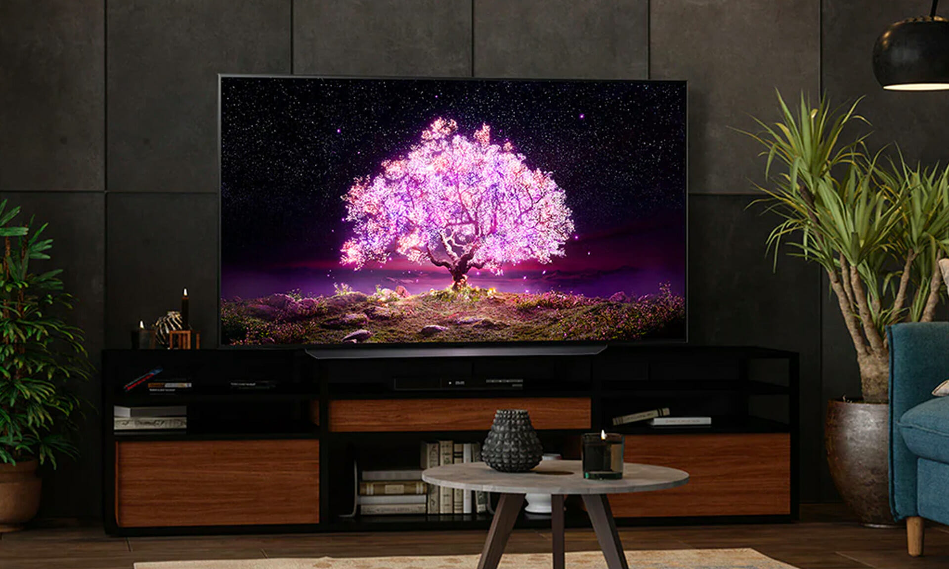 TV with a pink tree as a background