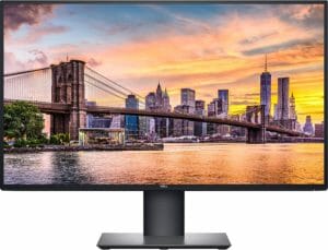 Dell monitor with a bridge and city as a background