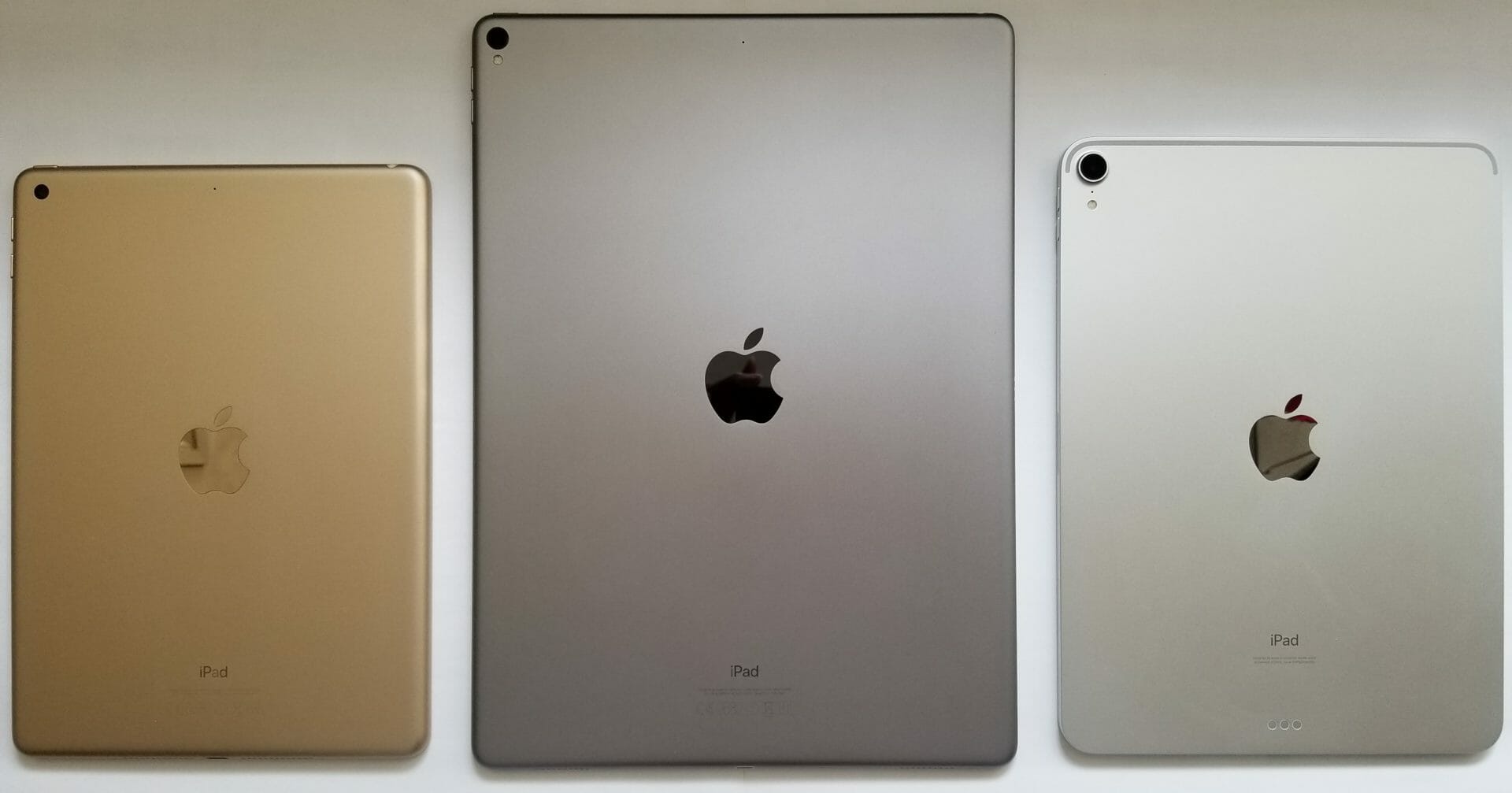 3 Ipad models in different colors