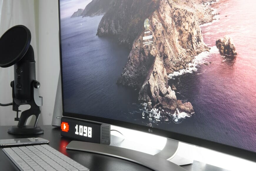 a large monitor on the desk