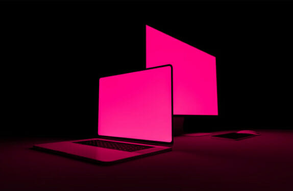pink screens on laptop and monitor