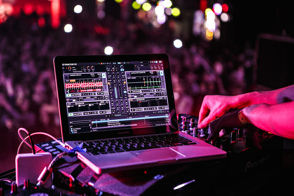 DJ on a rave on a laptop