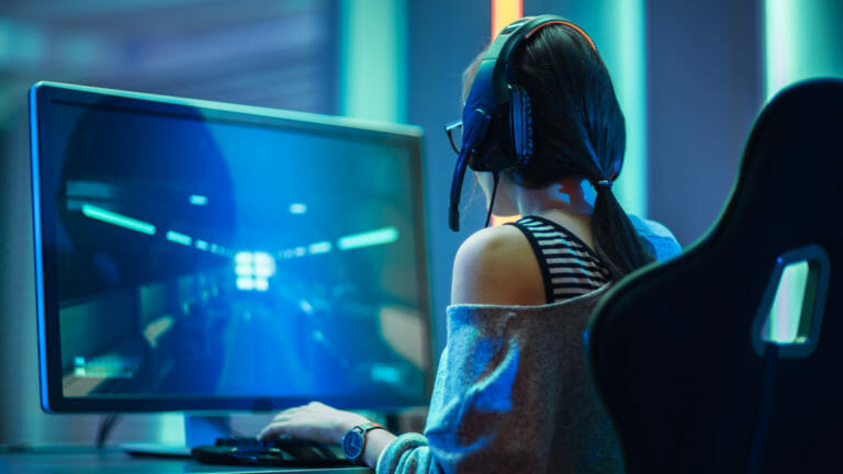 girl at a computer playing games