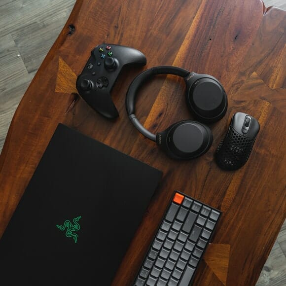 laptop, keyboard, headphones and mouse