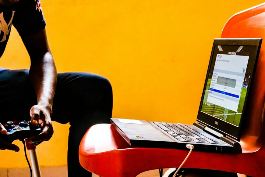 a person playing a game on laptop