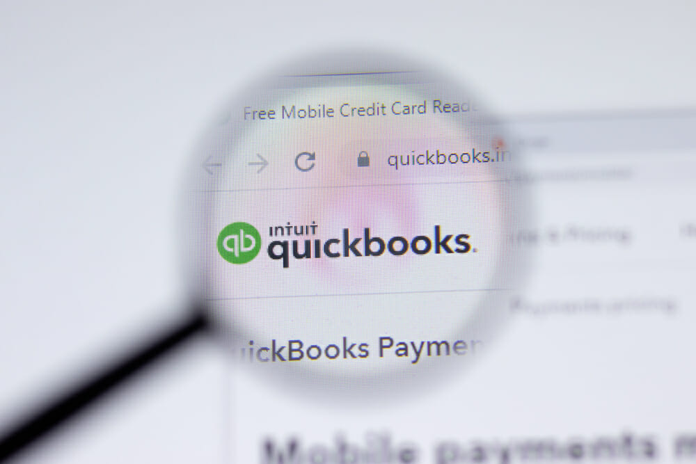 Quickbooks and a magnifying glass