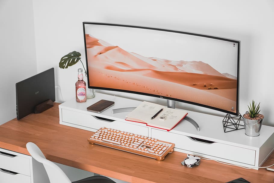 ultrawide monitor on the desk in workspace