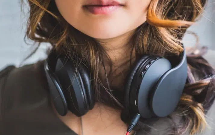 a female person with headphones