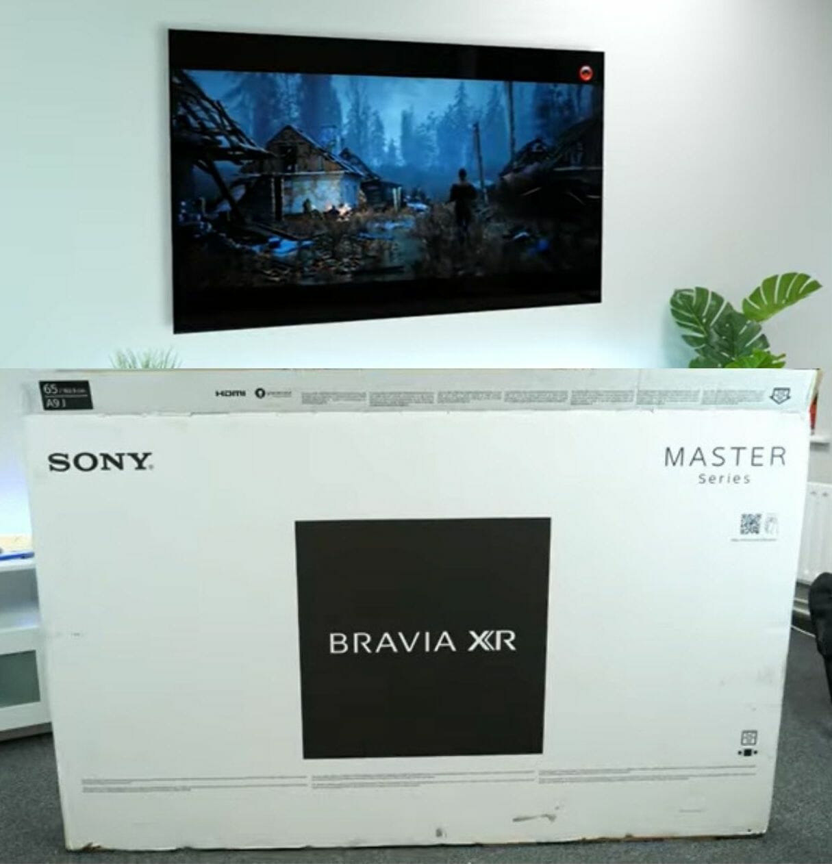 The box of Sony Bravia and TV on the wall