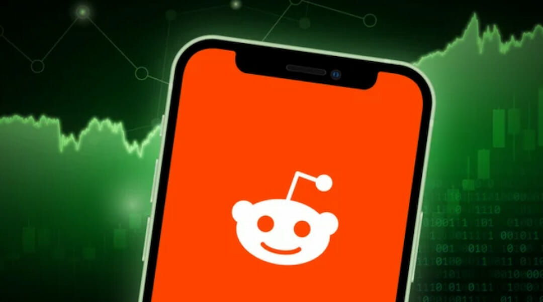 Reddit logo on the phone screen