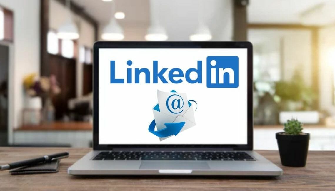 Linkedin logo and email icon on the laptop screen