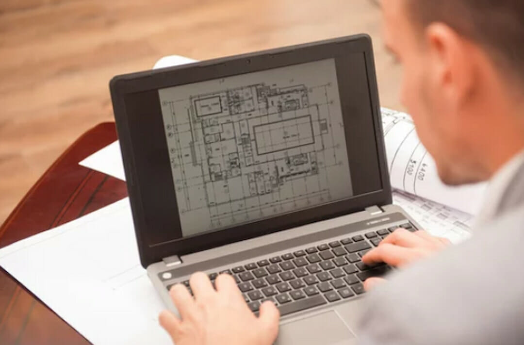 architectural drawing on the laptop screen