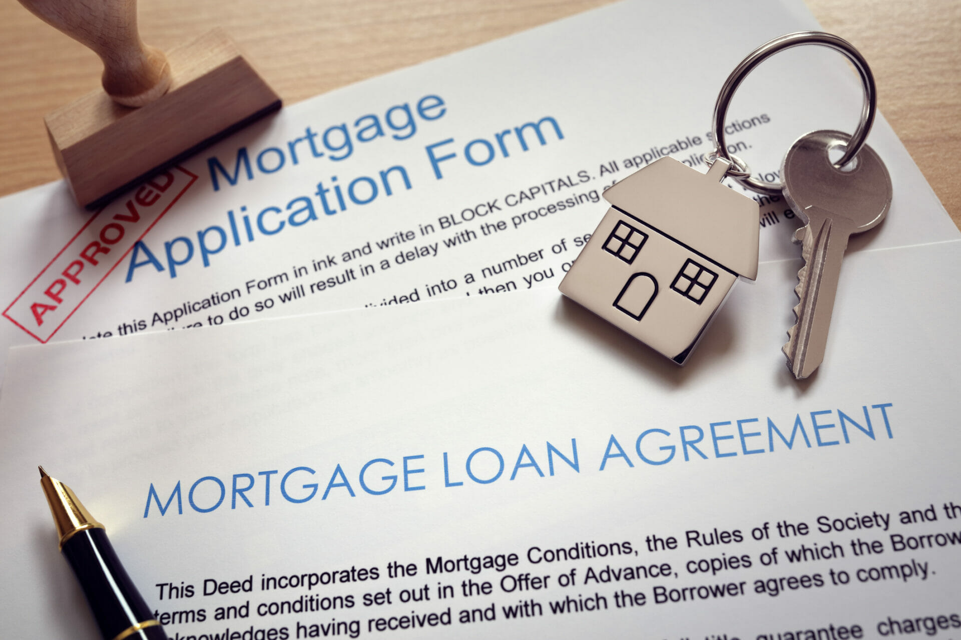 MOrtgage loan agreement document with a keychain